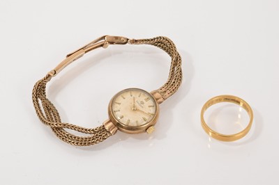 Lot 822 - 22ct gold wedding band and gold wristwatch on strap