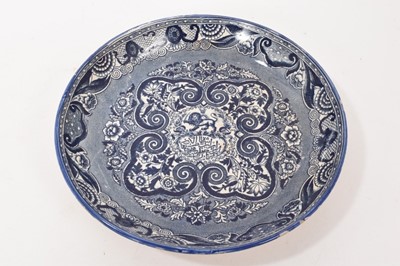 Lot 385 - Scarce 19th century English transfer printed blue and white pottery plate for the Persian market (Iran) the centre decorated with the emblem of Persia- a lion holding a sword with rising sun wit...