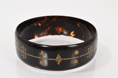 Lot 644 - Antique tortoiseshell and piqué work bangle