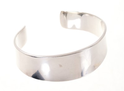 Lot 750 - Georg Jensen silver torque bangle of tapering concave form, marked 925S Denmark, No 188