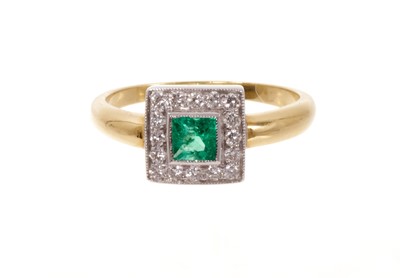 Lot 715 - Emerald and diamond cluster ring with a square-cut emerald surrounded by a border of brilliant cut diamonds in millegrain setting on 18ct gold shank