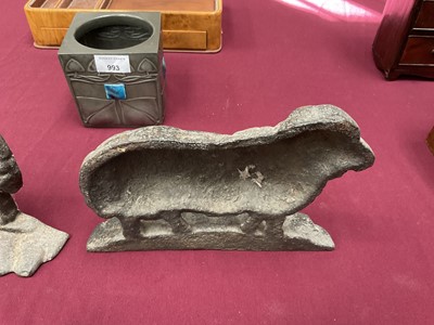 Lot 999 - Flock of four cast iron sheep doorstops, the largest 25cm long