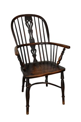 Lot 1506 - Early 19th century ash and elm Windsor chair, with pierced splat and solid saddle seat, raised on splayed supports with crinoline stretcher