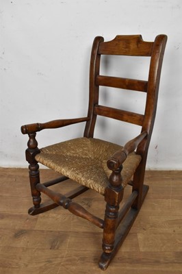 Lot 1509 - 19th century ash, elm and fruitwood child's rocking chair, with caned seat, total height 75cm