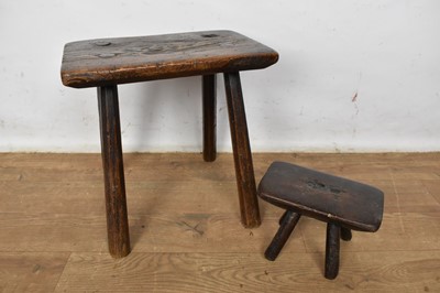 Lot 1510 - 19th century elm dairy stool, on four splayed supports, 33cm wide, together with a similar child's dairy stool