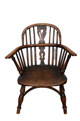 Lot 1519 - Early 19th century child's ash and elm Windsor chair, with pierced splat and solid seat on splayed turned supports united by a crinoline stretcher