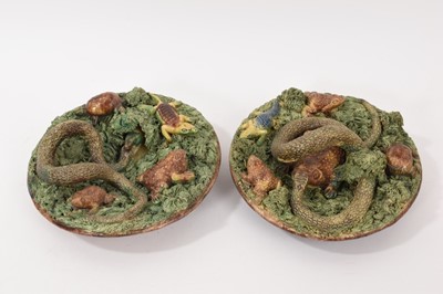 Lot 324 - Pair of Portuguese Palissy ware dishes, decorated with reptiles and amphibians, by M. Mafra Caldas, 18cm diameter