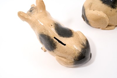 Lot 327 - A Scottish ceramic pig money box, early 20th century, marked to base, 15cm high, and a similar pig, 16cm high (2)