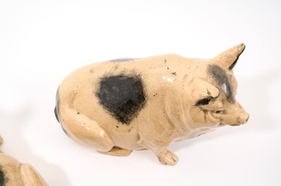 Lot 327 - A Scottish ceramic pig money box, early 20th century, marked to base, 15cm high, and a similar pig, 16cm high (2)