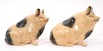 Lot 327 - A Scottish ceramic pig money box, early 20th century, marked to base, 15cm high, and a similar pig, 16cm high (2)