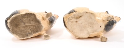 Lot 327 - A Scottish ceramic pig money box, early 20th century, marked to base, 15cm high, and a similar pig, 16cm high (2)