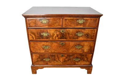 Lot 1554 - Early 18th century walnut crossbanded chest of drawers, having possibly later figured veneering to the top and two short over three long graduated drawers on bracket feet, 96cm wide x 56cm deep...