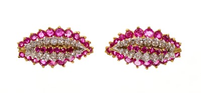 Lot 692 - Pair of 1960s ruby and diamond cluster leaf shaped earrings