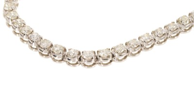 Lot 613 - Diamond rivière necklace with brilliant cut diamonds in 18ct white gold setting, estimated total diamond weight approximately 7.91cts.