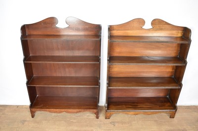 Lot 1600 - Near pair of Regency style mahogany waterfall bookcases, each approximately 80cm wide x 109cm high