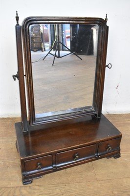 Lot 1602 - George III mahogany swing frame toilet mirror, of small size, with original arched silvered plate, the base with three drawers on ogee bracket feet, 35cm wide x 50cm high