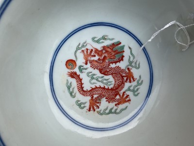 Lot 329 - A pair of Chinese porcelain bowls, Daoguang mark and period, decorated with a dragon and phoenix pattern in the Wucai style, 14.75cm diameter Provenance: brought home by Sir Francis Drum...