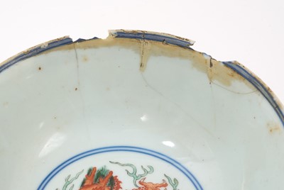 Lot 329 - A pair of Chinese porcelain bowls, Daoguang mark and period, decorated with a dragon and phoenix pattern in the Wucai style, 14.75cm diameter Provenance: brought home by Sir Francis Drum...