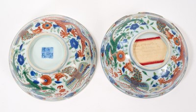 Lot 329 - A pair of Chinese porcelain bowls, Daoguang mark and period, decorated with a dragon and phoenix pattern in the Wucai style, 14.75cm diameter Provenance: brought home by Sir Francis Drum...