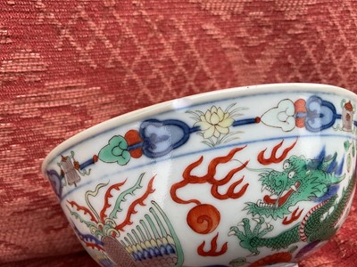 Lot 329 - A pair of Chinese porcelain bowls, Daoguang mark and period, decorated with a dragon and phoenix pattern in the Wucai style, 14.75cm diameter Provenance: brought home by Sir Francis Drum...