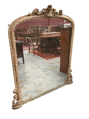 Lot 1648 - Victorian overmantel mirror with distressed finish, scroll cresting, and beaded edge, approximately 141cm high x 130cm wide