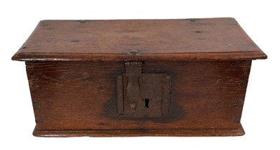 Lot 1526 - Early 17th century oak strong box, with original iron hasp and lock and flanking drop handles, 51cm wide x 24cm deep x 20cm high