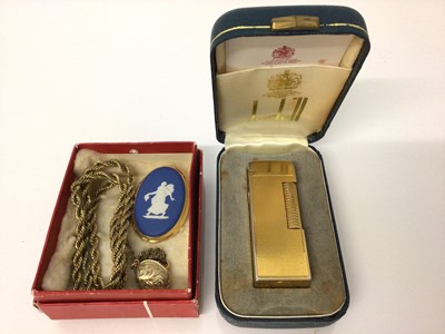 Lot 79 - Dunhill gold plated lighter in original box, together with a Wedgwood brooch and a gold plated chain and locket