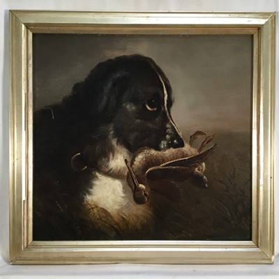 Lot 30 - Early 20th century oil on millboard - Game dog holding a snipe