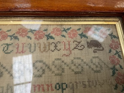 Lot 1145 - Early Victorian needlework sampler