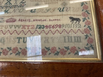 Lot 1145 - Early Victorian needlework sampler