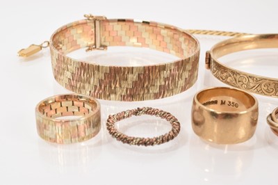 Lot 122 - 9ct three-colour gold bracelet and similar ring, two other 9ct gold rings, 9ct three-colour gold 'Russian' ring, rope twist ring, yellow metal chain bracelet and a gold plated bangle