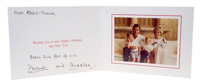 Lot 101 - T.R.H. The Prince and Princess of Wales, signed 1987 Christmas card with twin gilt Royal ciphers to cover, colour photograph to the interior of the Royal couple with their children on holiday. In...