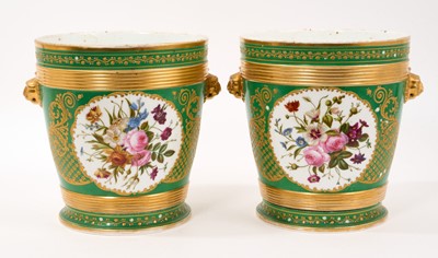 Lot 349 - Pair of 19th century French porcelain cachepots, painted with floral panels on a green and gilt-tooled ground, with lion-mask handles, 20.5cm high