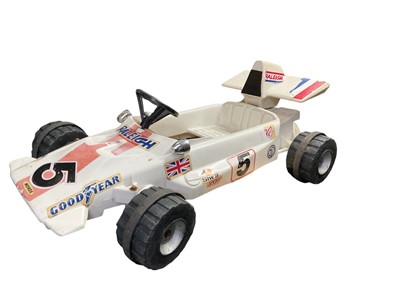 Lot 125 - 1970s Raleigh children's F1 pedal car, approximately 103cm in length.