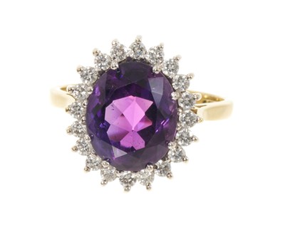 Lot 652 - Amethyst and diamond cluster ring