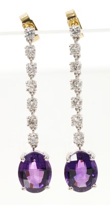 Lot 653 - Pair of amethyst and diamond pendant drop earrings