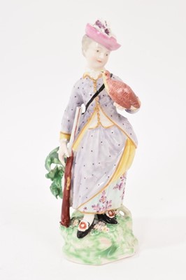 Lot 388 - Derby figure, circa 1800, of a woman with a rifle, holding a partridge, incised marks to base, 15.5cm high