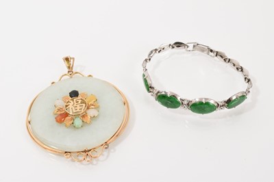 Lot 660 - Chinese jade / green hardstone bracelet in white metal setting, stamped 14K, together with a Chinese jade and hardstone gold mounted disc pendant