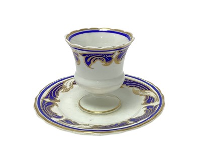 Lot 147 - Scarce King Edward VII, Spode Copeland China egg cup made for the Royal Yacht Victoria & Albert with crowned garter inscribed 'Royal Yacht' , blue and gilt scroll decoration with integral sa...
