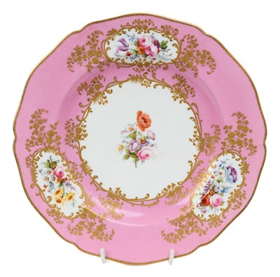 Lot 156 - H.M. Queen Victoria, fine Coalport dinner plate from the Windsor Castle service, circa 1850 in the Sèvres-style with finely painted floral reserves with raised gilt borders and pink ground, print...