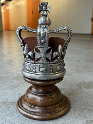 Lot 126 - H.M. Queen Elizabeth II cast metal Queen’s Crown, raised on a turned wooden base, 30cm