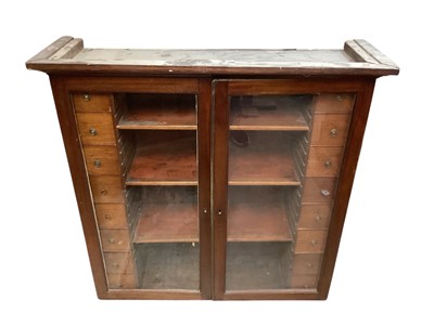 Lot 1690 - 19th century glazed apothecary cabinet, housing shelves and two banks of short drawers