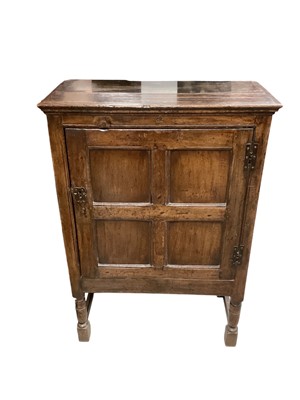 Lot 1692 - Late 17th century oak boarded cabinet with panelled door