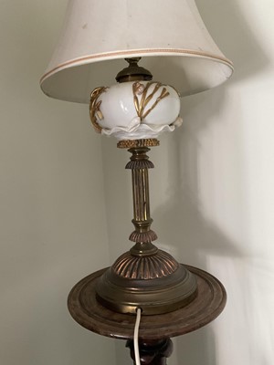 Lot 170 - Victorian gilt brass and ceramic lamp, in the manner of Moore Brothers, converted for electricity, the reservoir with nautical theme, with shade