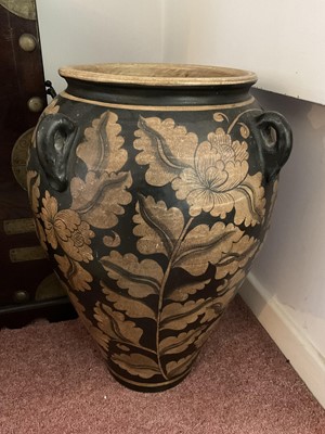 Lot 1699 - Large terracotta floor vase, painted with scrolling foliage, 56cm high