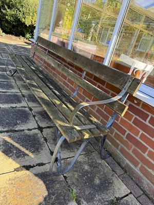 Lot 1703 - Garden bench, cast iron, with wooden slats, 238cm long