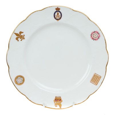 Lot 160 - H.M. Queen Victoria, Mintons Royal dinner service believed made for Windsor Castle with polychrome painted badges of state to the border and moulded swags and gilt edging, Mintons and T.Goode and...