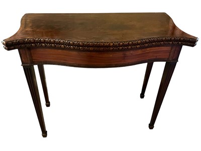 Lot 1709 - Fine quality George III mahogany serpentine card table, the serpentine fold over top with egg and dart carved edge on fluted legs and spade feet, 91cm wide x 46cm dee...