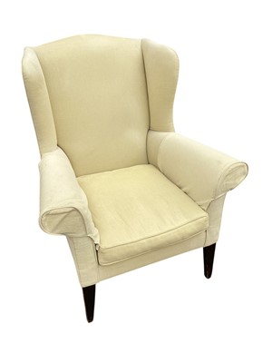 Lot 1205 - Georgian style yellow upholstered wing armchair, raised on square tapered legs