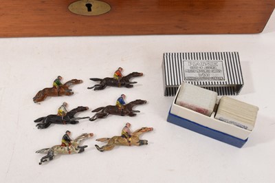 Lot 1179 - Edwardian mahogany games compendium with fitted interior comprising draughts, chess, backgammon, solitaire, dominoes, bezique, cribbage and classic steeplechase horse racing game